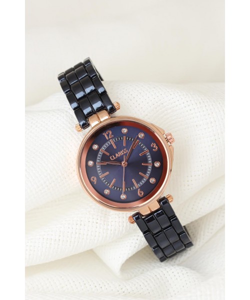 Lacivert Renk Metal Kordonlu Zirkon Taşlı İç Tasarımlı Clariss Marka Bayan Kol Saati Lacivert Renk Metal Kordonlu Zirkon Taşlı İç Tasarımlı Clariss Marka Bayan Kol Saati